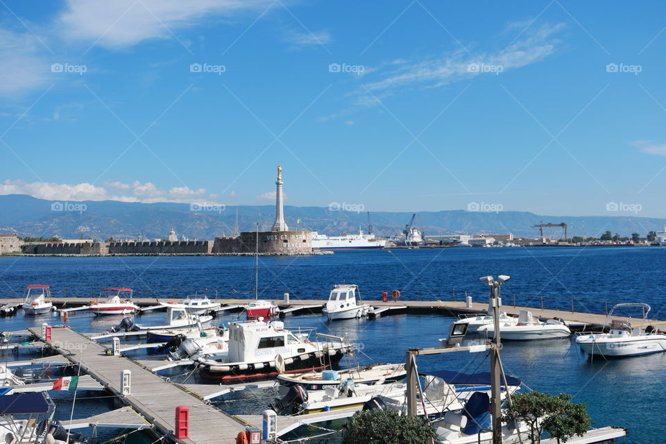 madonnina con porticciolo. View of messina's madonnina from the port