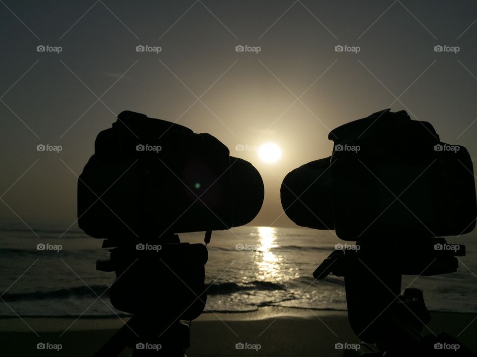 Camera. Camera and the sun and the sea