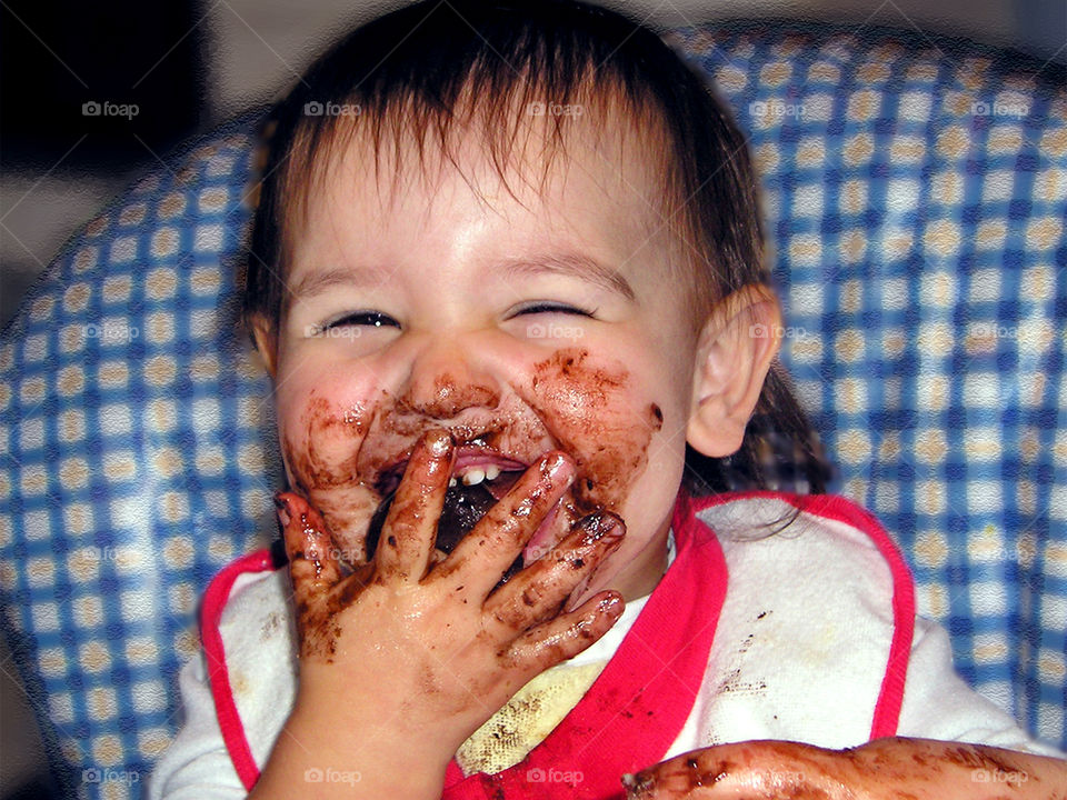 Be like the child & smile at the simple joys of life! This is a shot of my girl discovering her first chocolate covered mint cookie. The chocolate was mostly on her face & hands but the ear to ear grin on her face showed all the joy!๐