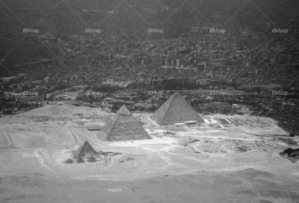 Ancient Egypt The Giza Pyramids. I was lucky enough this day, the plane had to change its way so I was able to take this aerial shot.