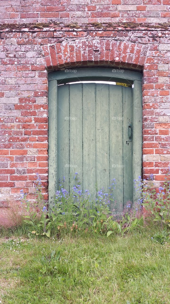 the secret garden. found this door to a secret walled garden while out walking.