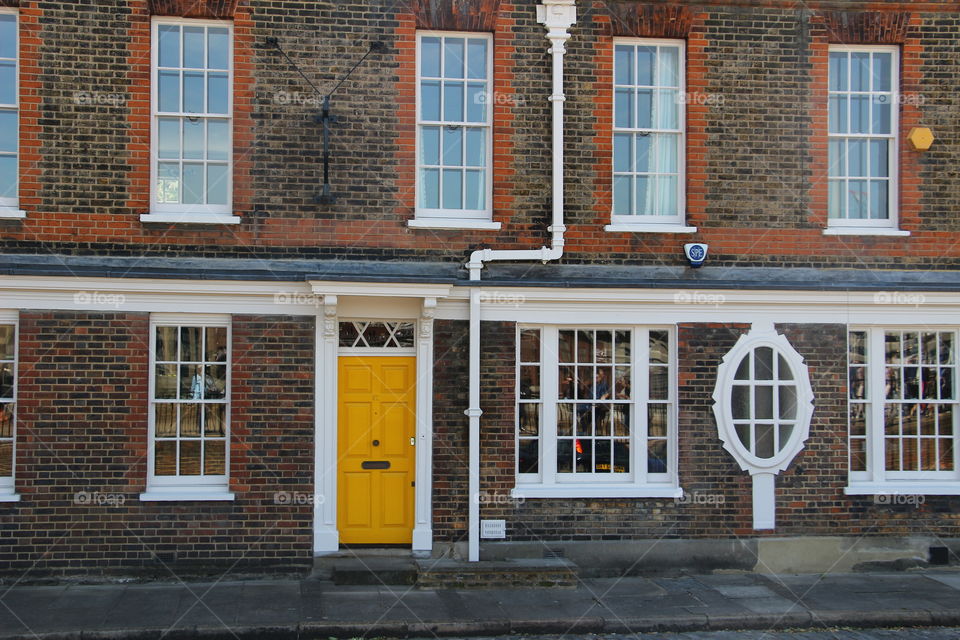 Building with yellow door