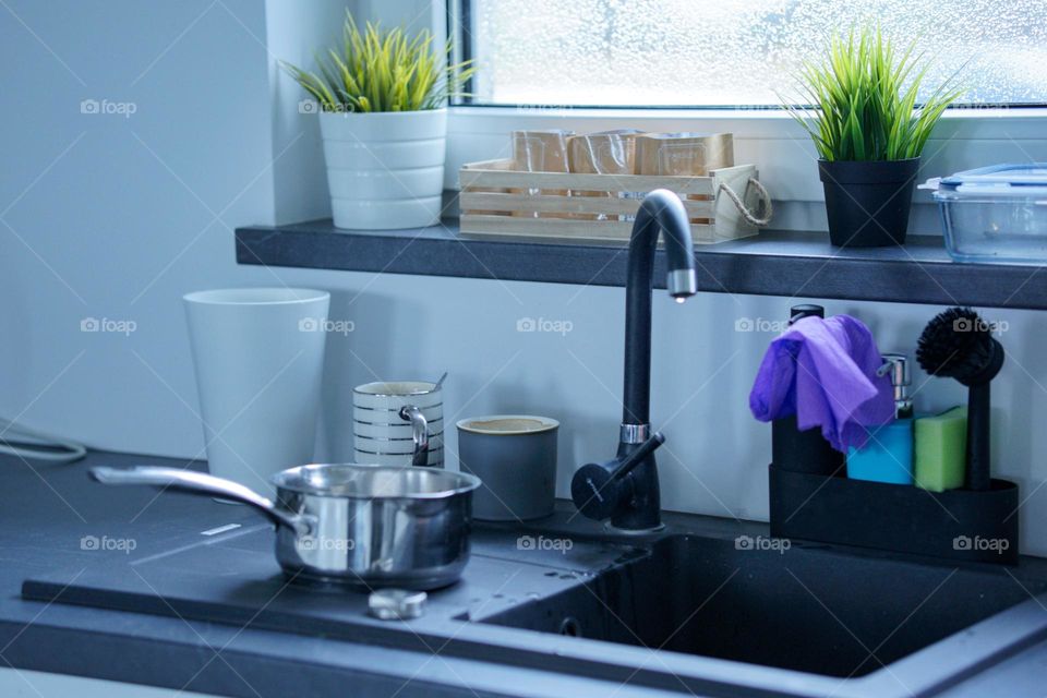 Kitchen while doing housework. Finishing the dishwashing.