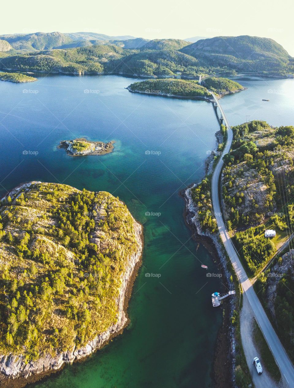 Aerial view of green and brown Island during day time