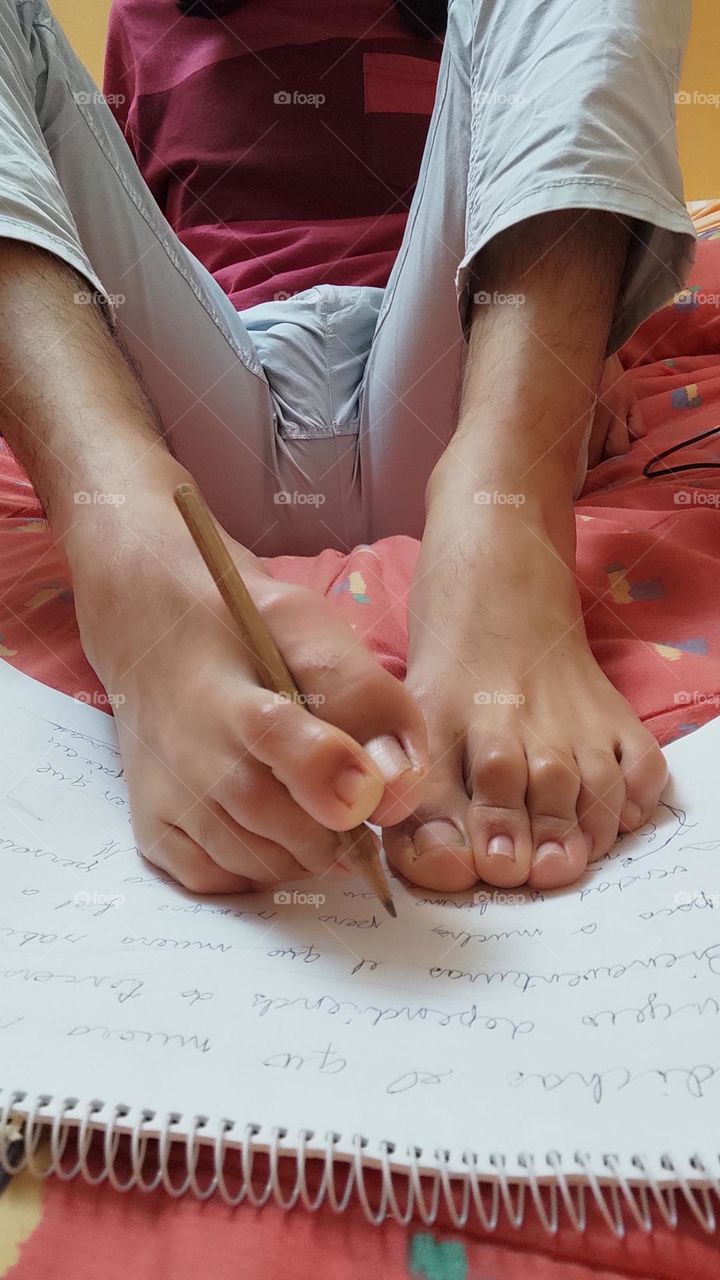 Writing inspiring messages with beautiful calligraphy using my pretty and dexterous feet