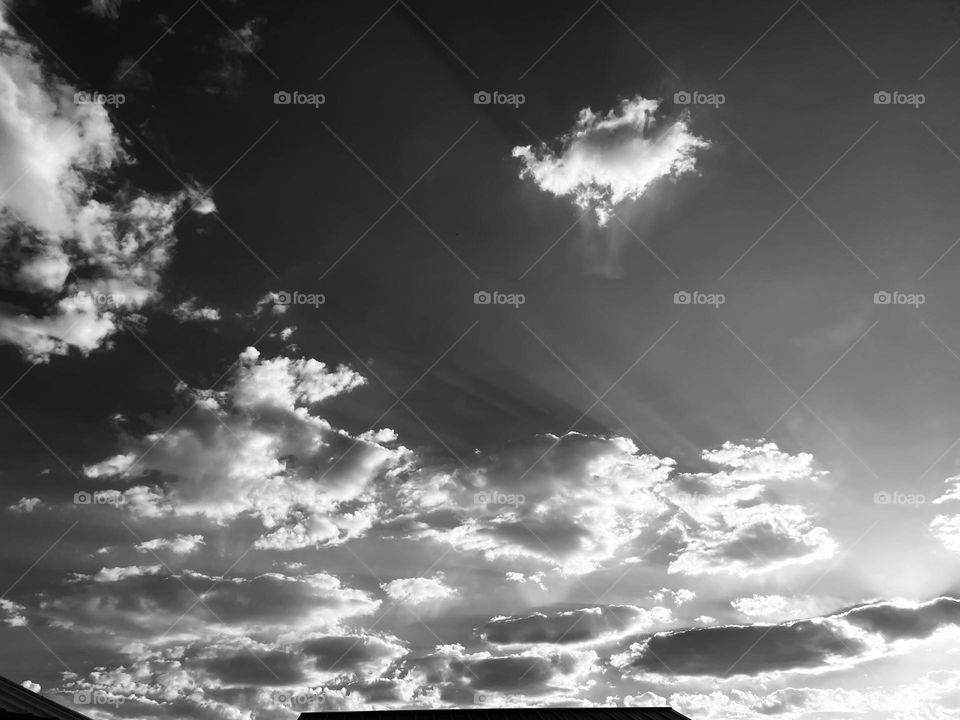 A black and white photo of a cloudy sky.