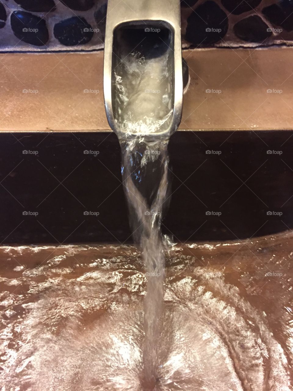 Water in motion from faucet