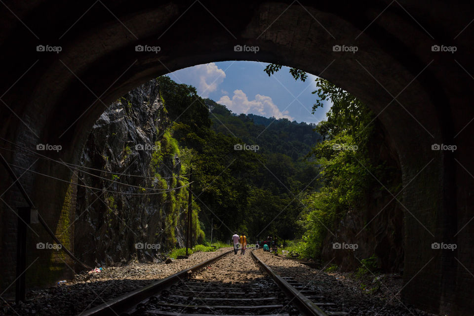 Railway tracks passing through tunnel