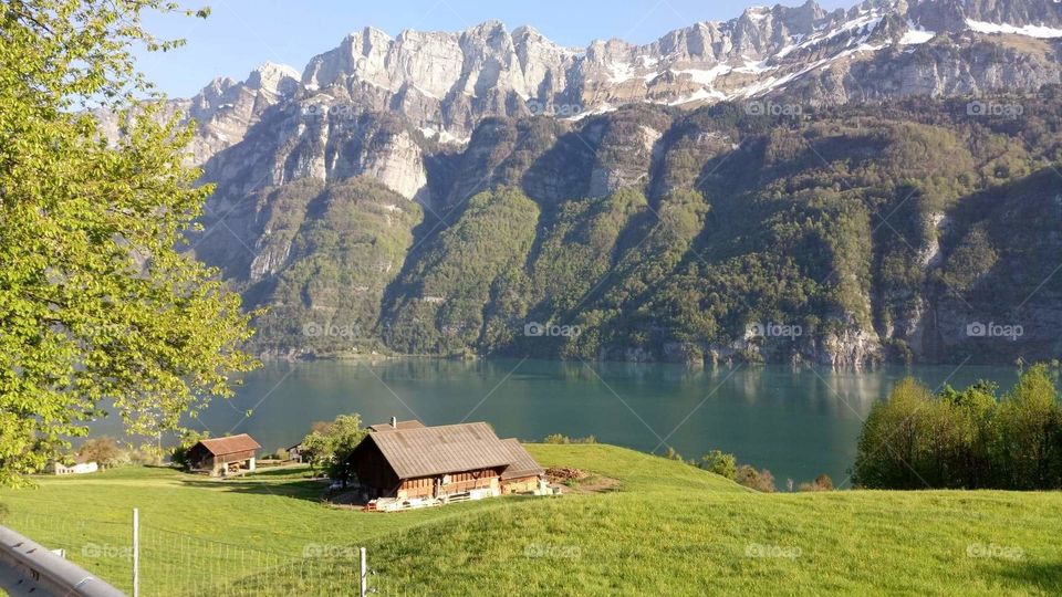 Samtisersee Switzerland lake mountains house view