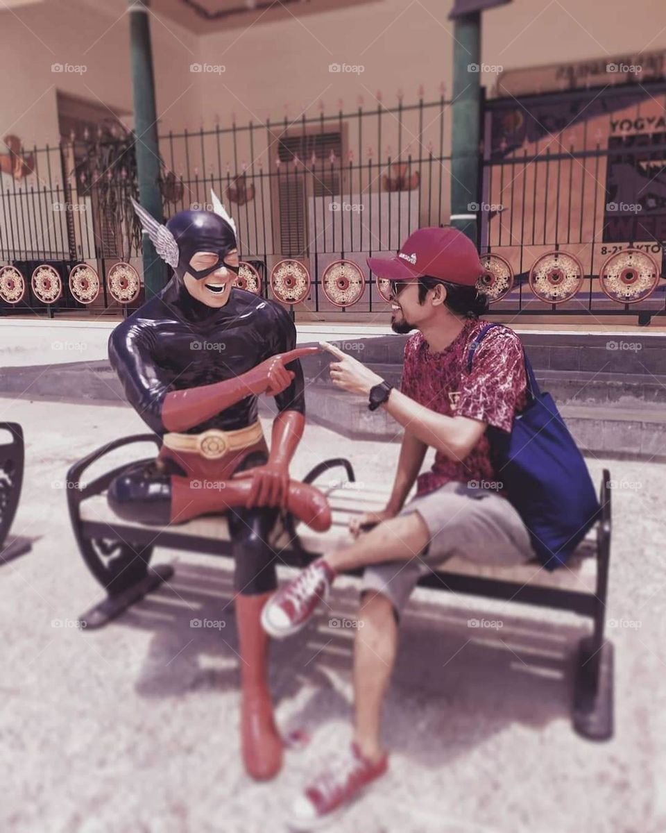 Joking with the Batman statue on Jalan Malioboro, Yogyakarta, Indonesia.  Sunday 5 December 2021