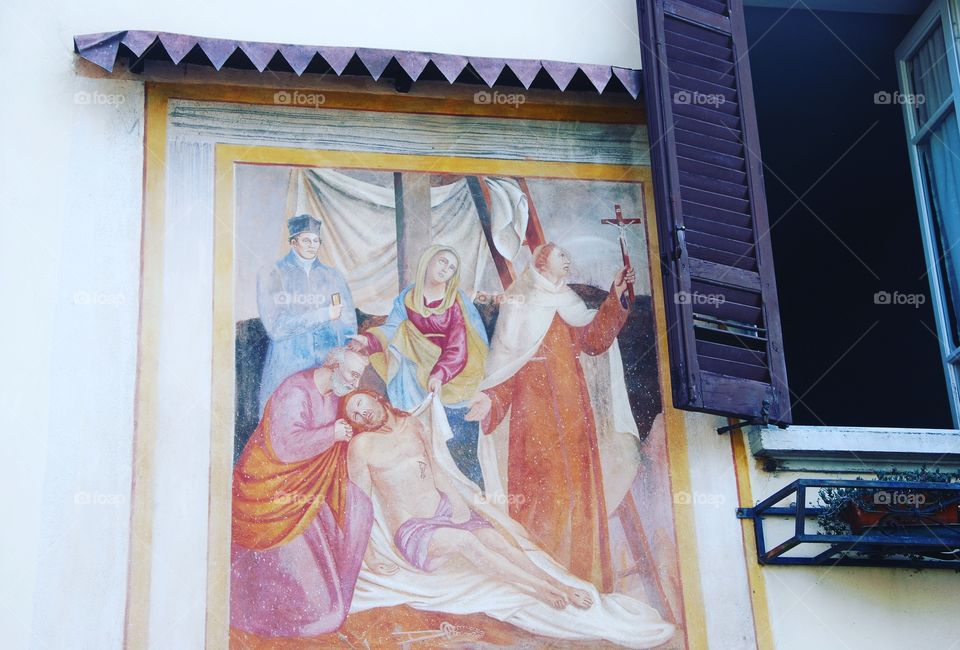 Fresco of the Deposition on the wall of a house - Brinzio, Varese, Italy.