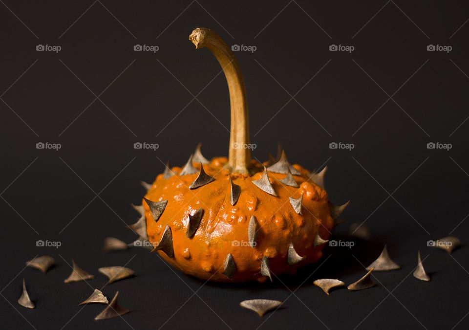 Halloween spiky pumpkin on black background