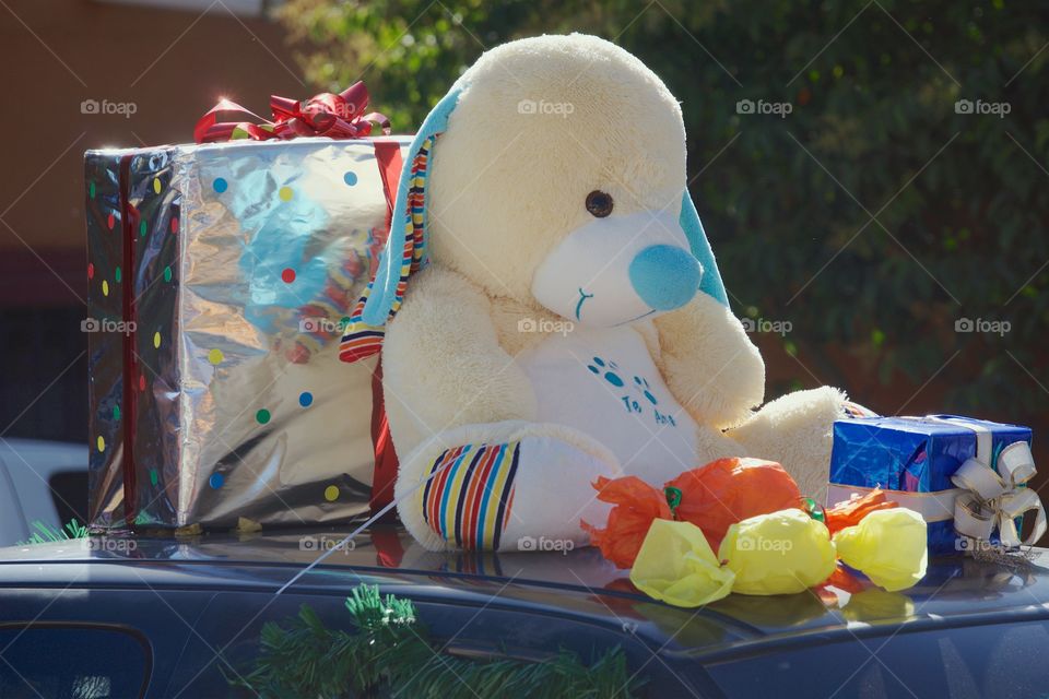 Wrapped gifts on top of a van for the children of San Miguel de Allende, Mexico in celebration of the Three Kings Day (feast of epiphany),