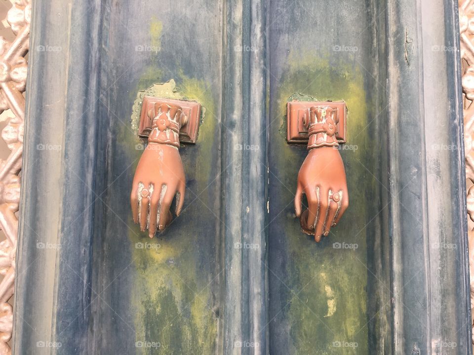Door bells in form of hands