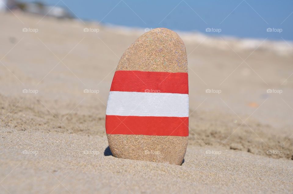 Austria flag on a stone