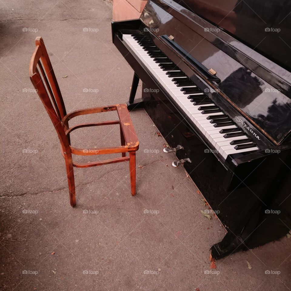Piano and chair without seat