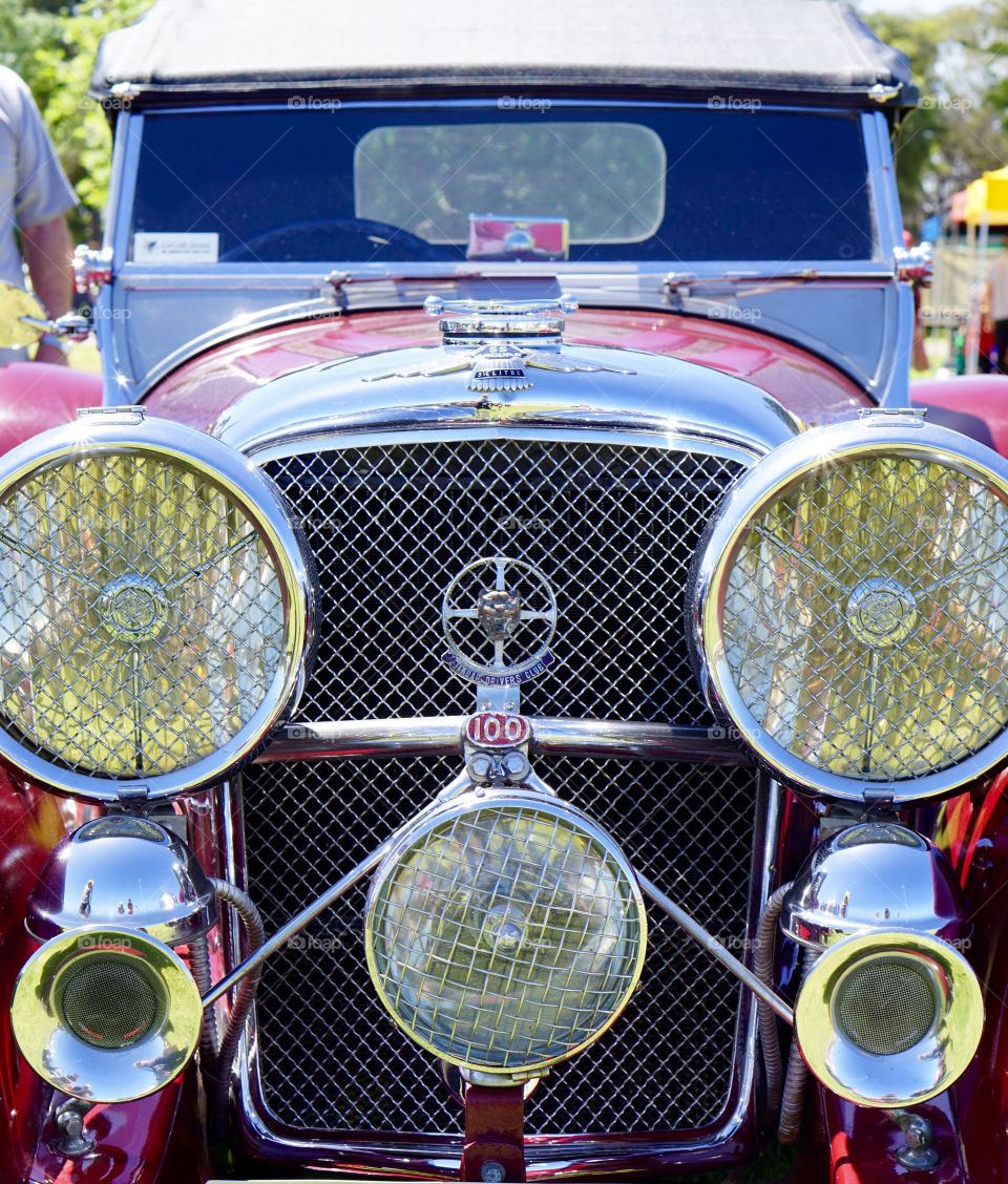 Vintag Jaguar SS. Vintage Jaguar SS classic car with chrome and wire grill and driving lights
