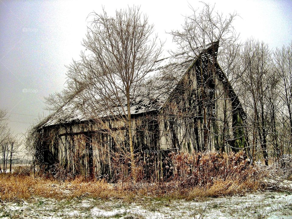 Rustic snowy barn