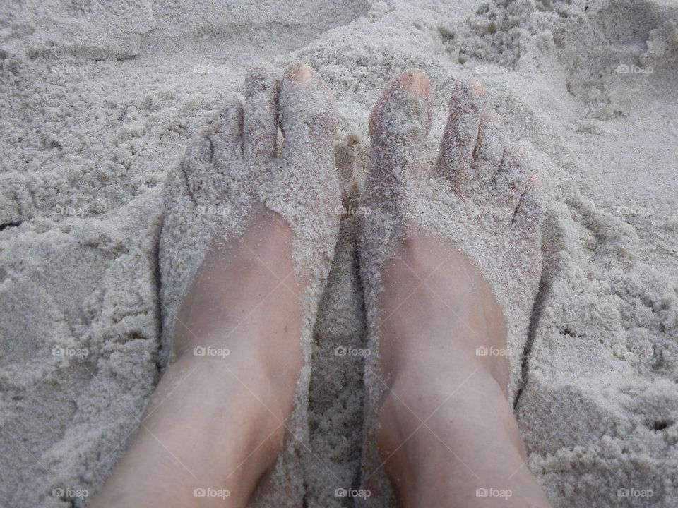 feet in the sand