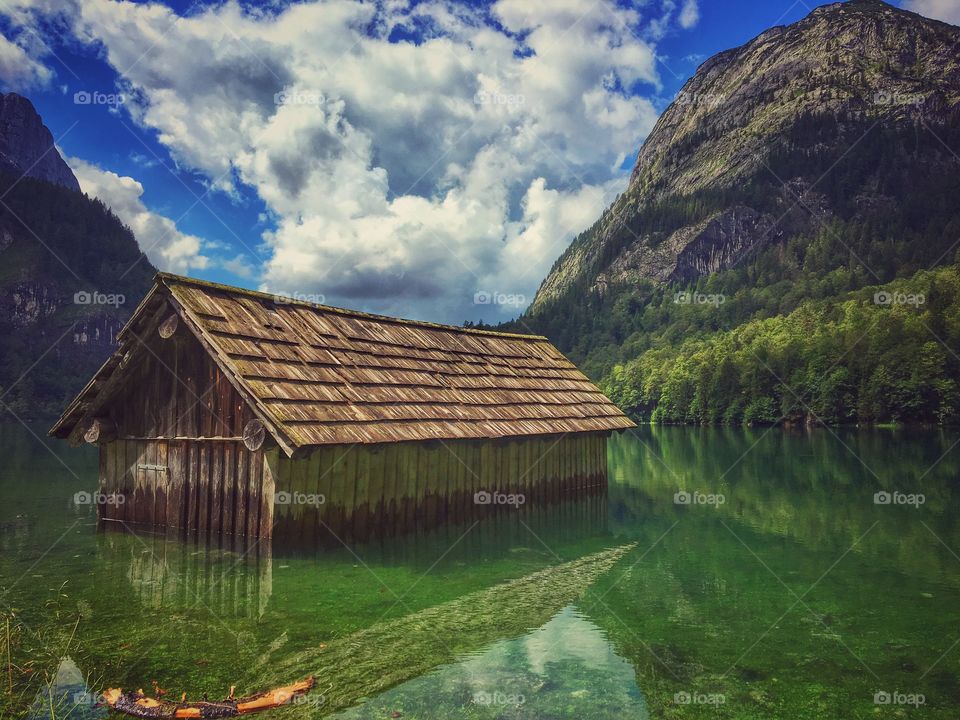Wooden house in lake