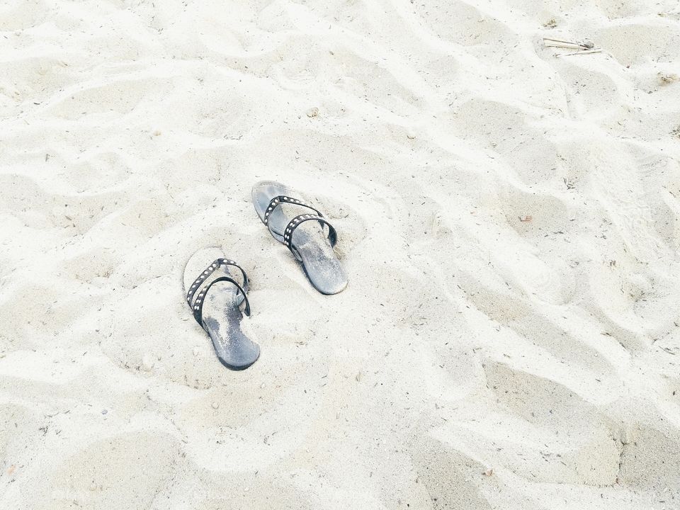 Flip flops on the sand