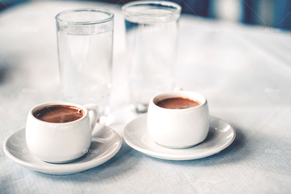 Coffee with drinking water in glass