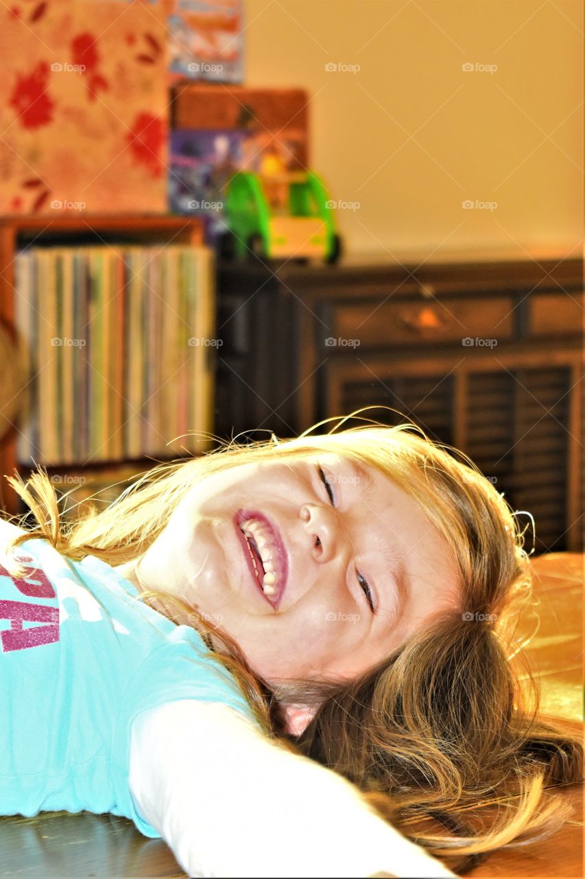 girl smiling and laughing