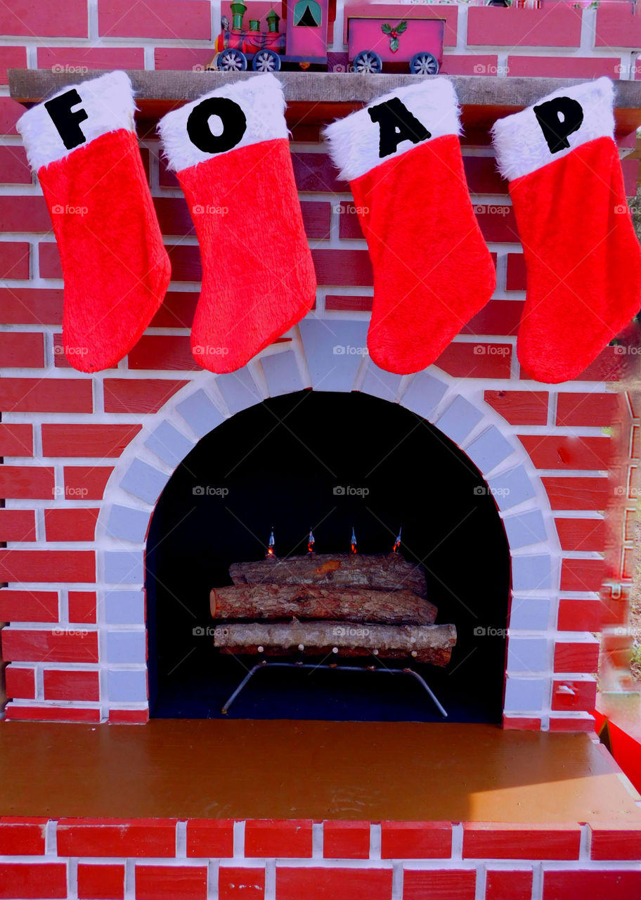 Red Stocking on a red fireplace! The Red Story! Red is color of passion. It's the color that is always seen on heart decorations on     Valentine's Day! Red is astonishing, exhilarating, and fills your world through feelings and emotions! 