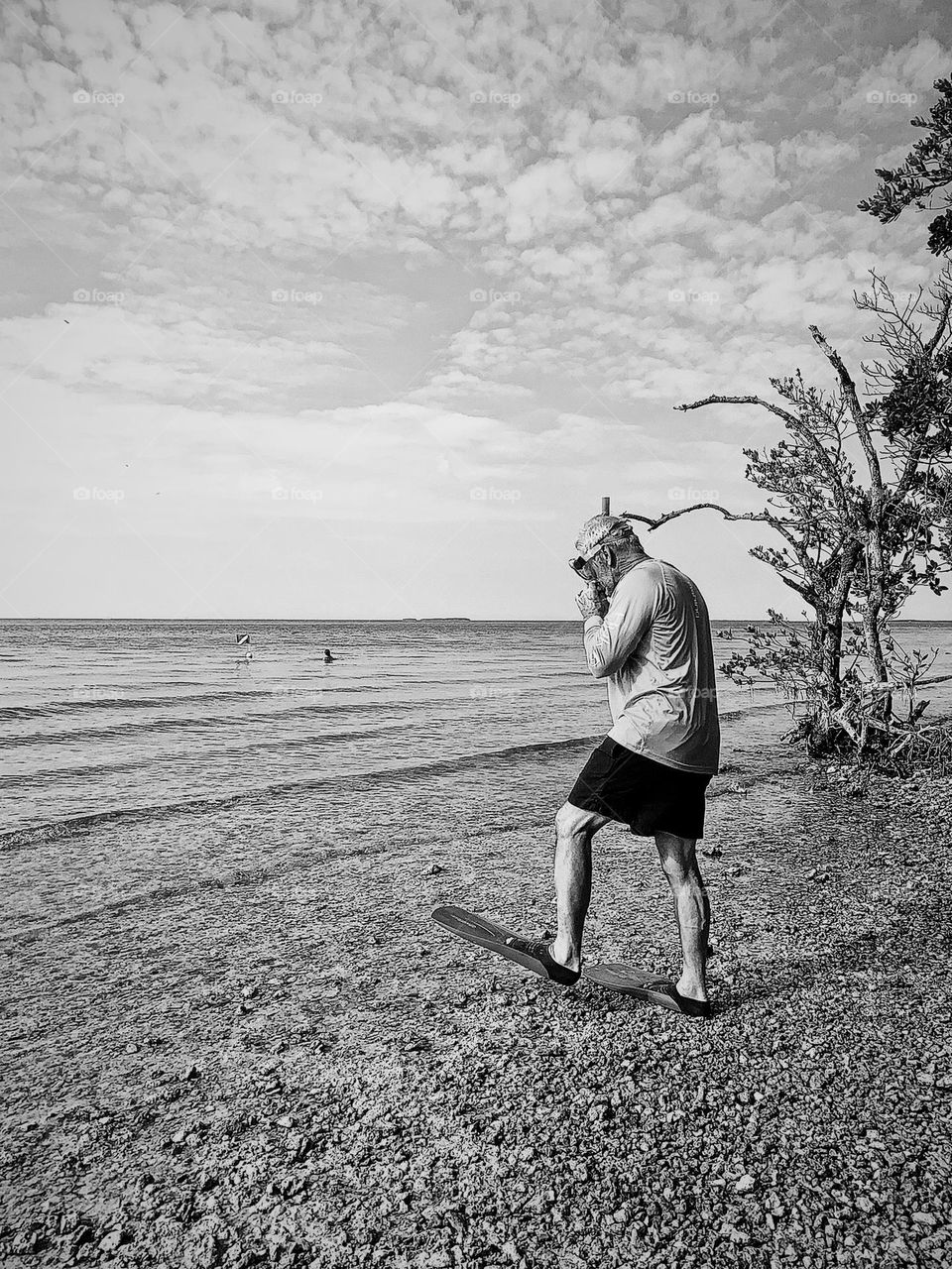 WALKING INTO THE WATER