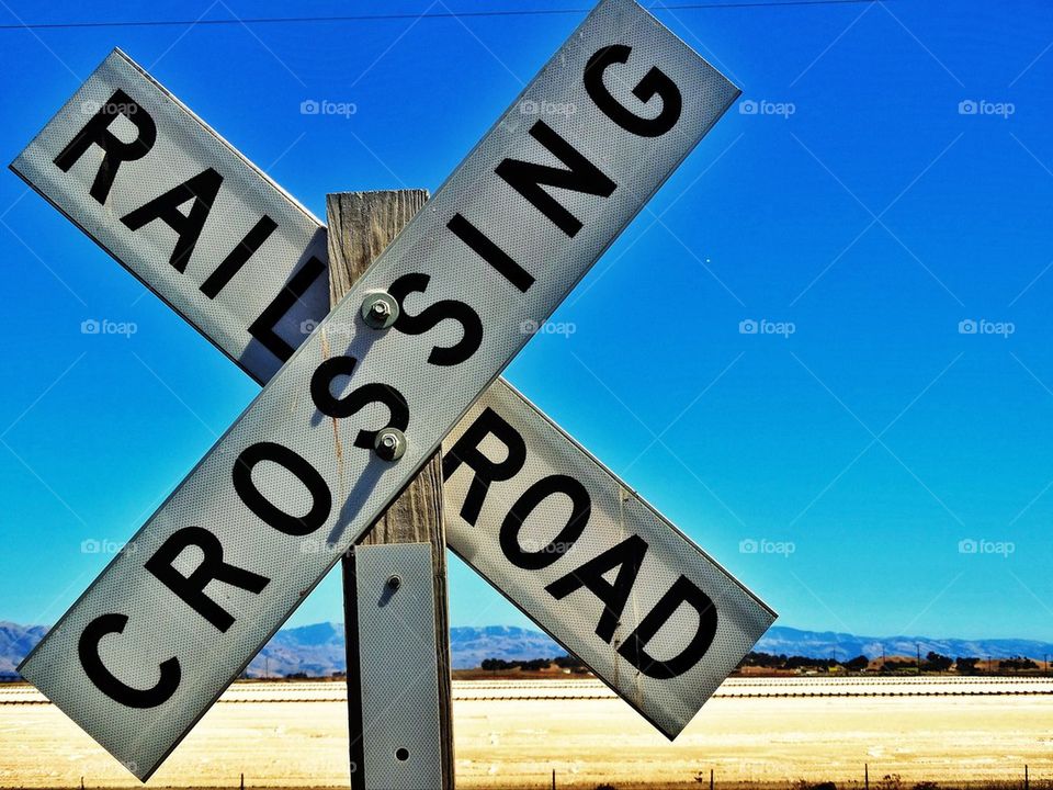 Railroad crossing in the desert