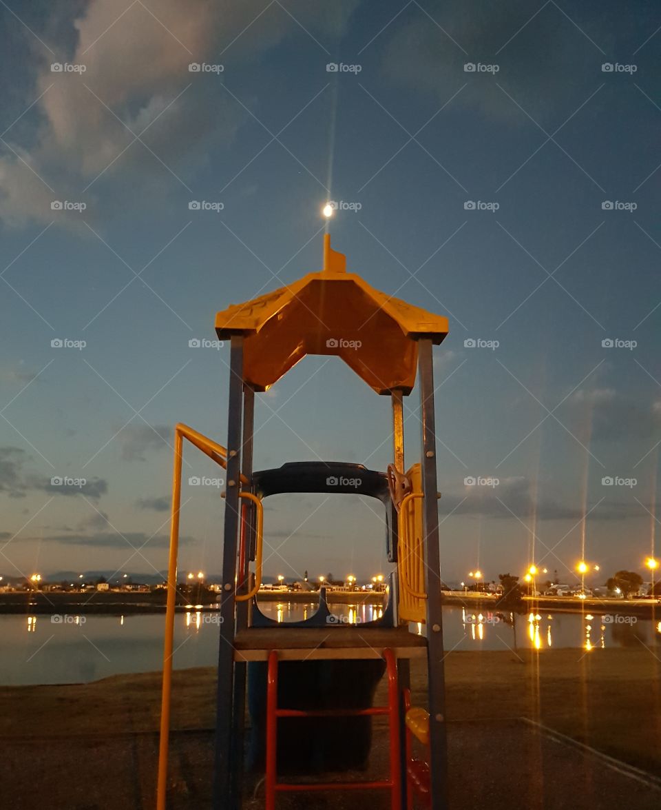 Pandora's play ground at the beautiful pandora pond in Napier. Managed to capture the moon atop this slide. The children do not play this late.