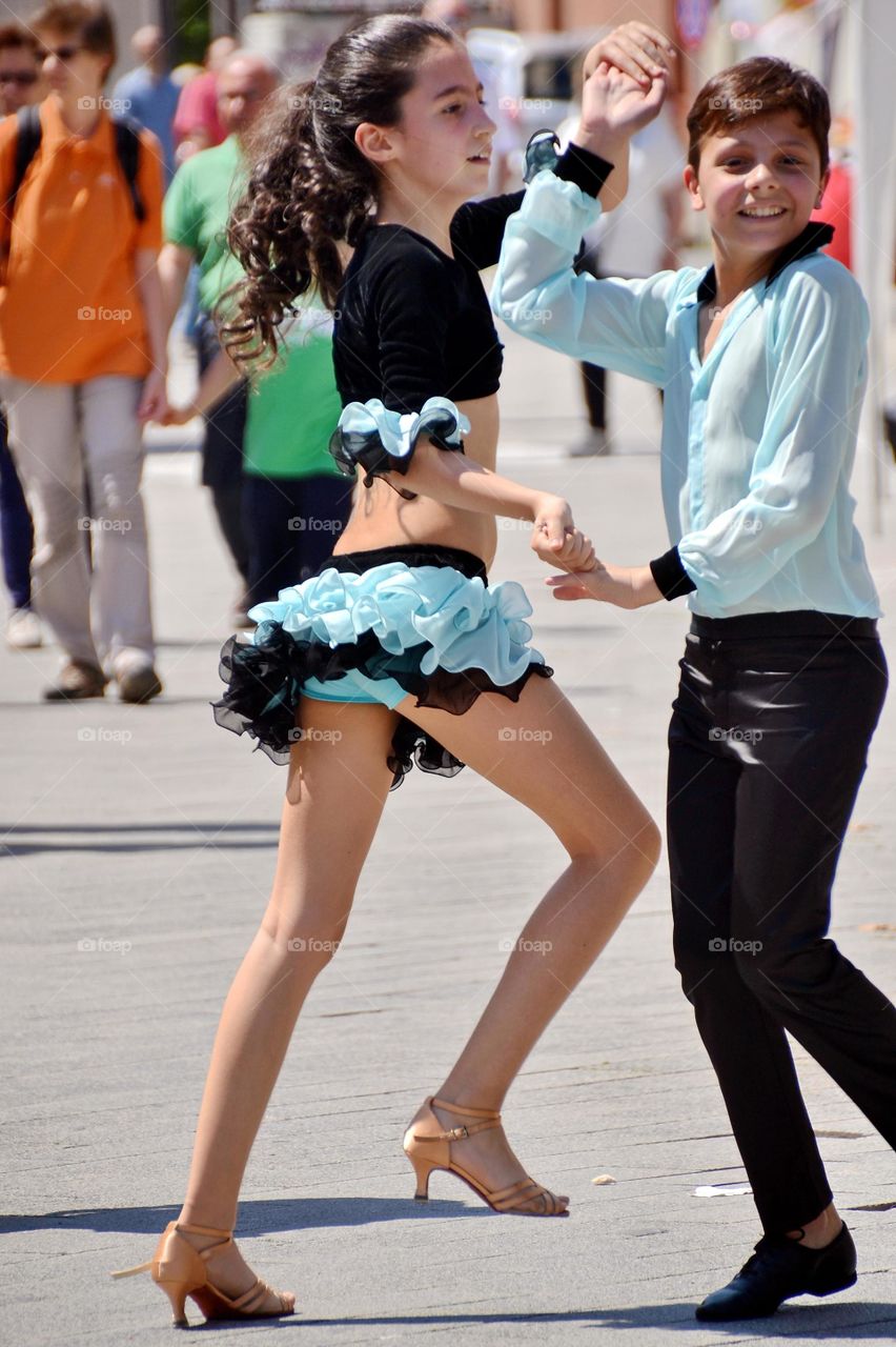 young couple  dancing in the street
