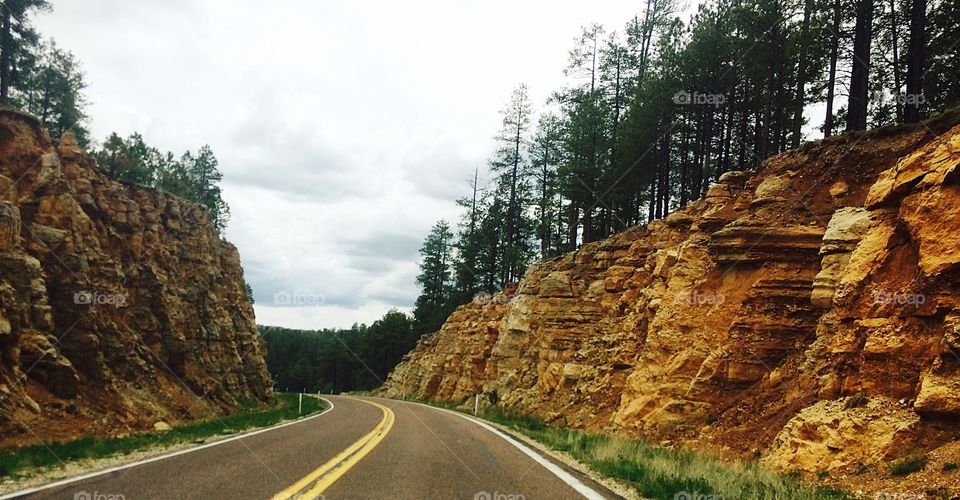 View of highway through rocky mountain