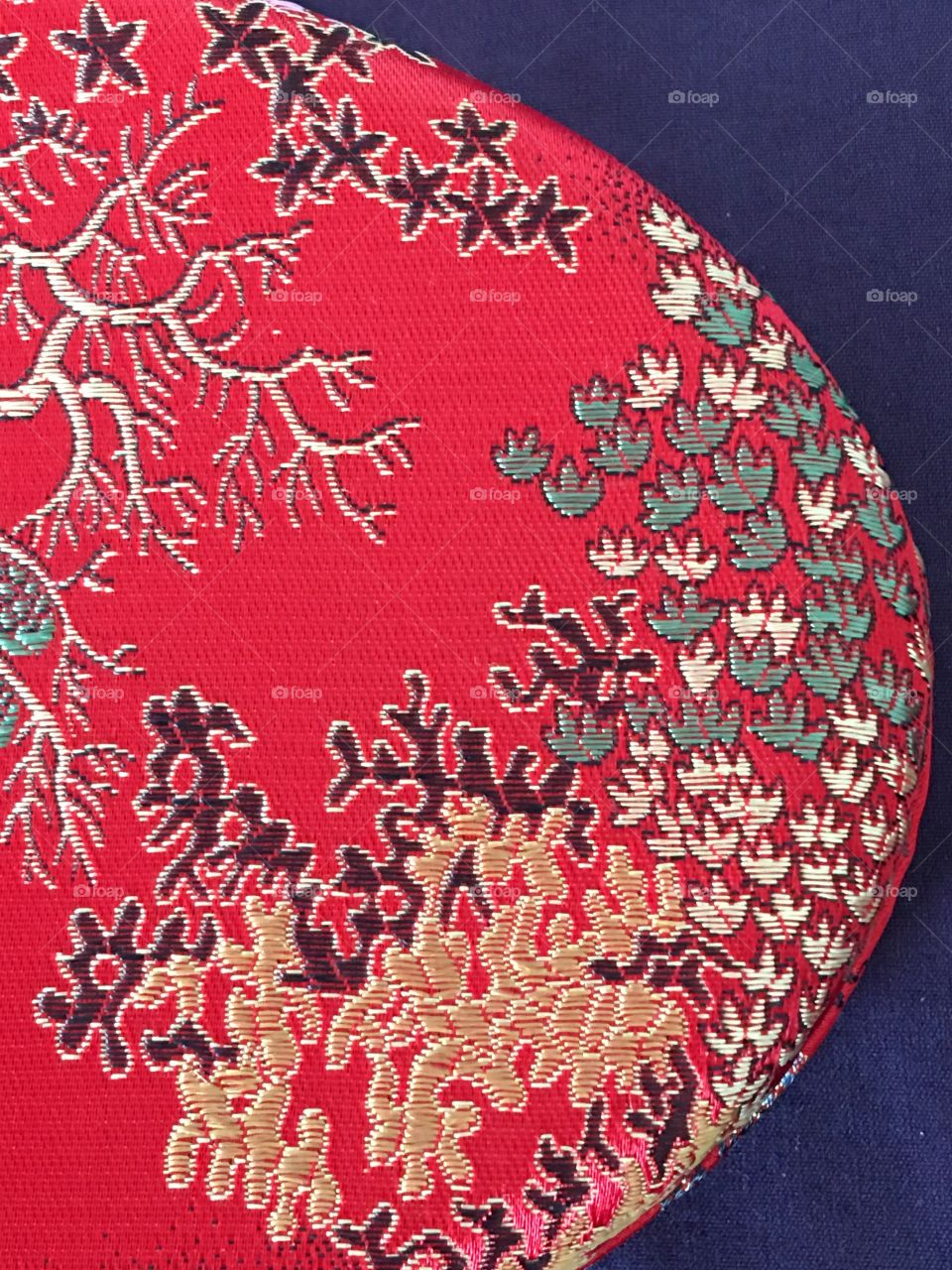 Red Asian fabric close up 