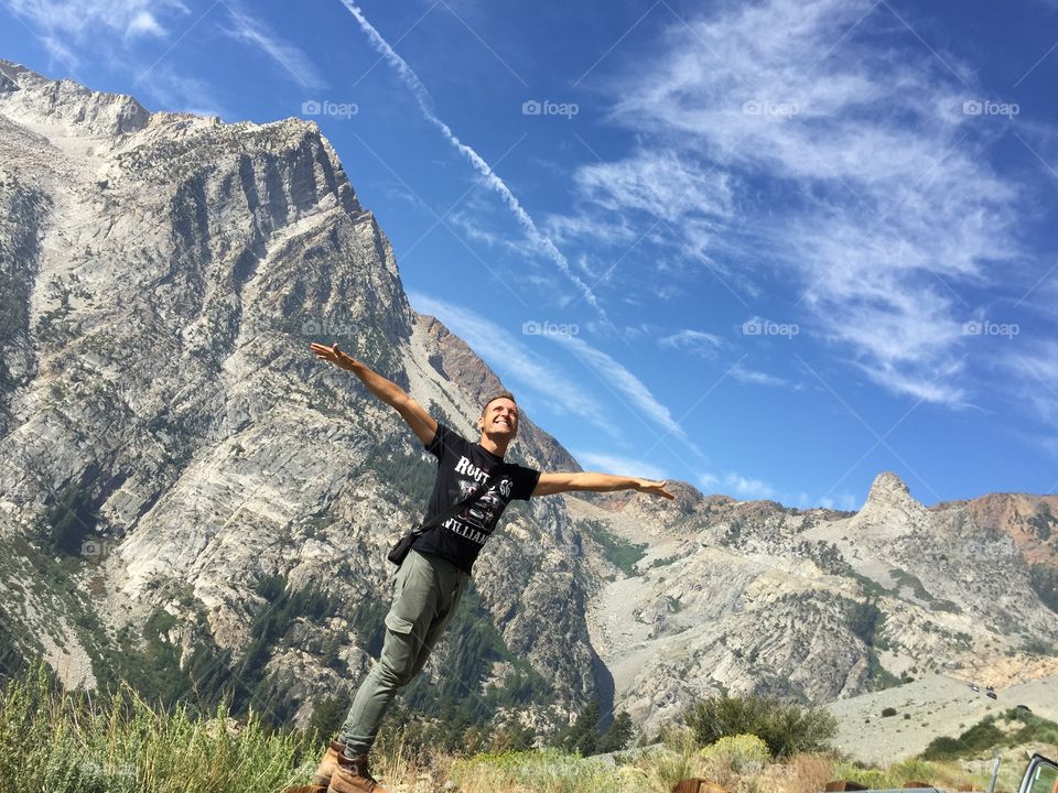 Happy man in the mountain