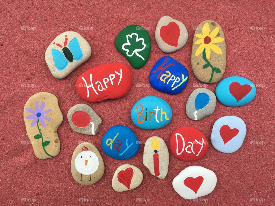 Happy  Birthday message woth many colored stones 