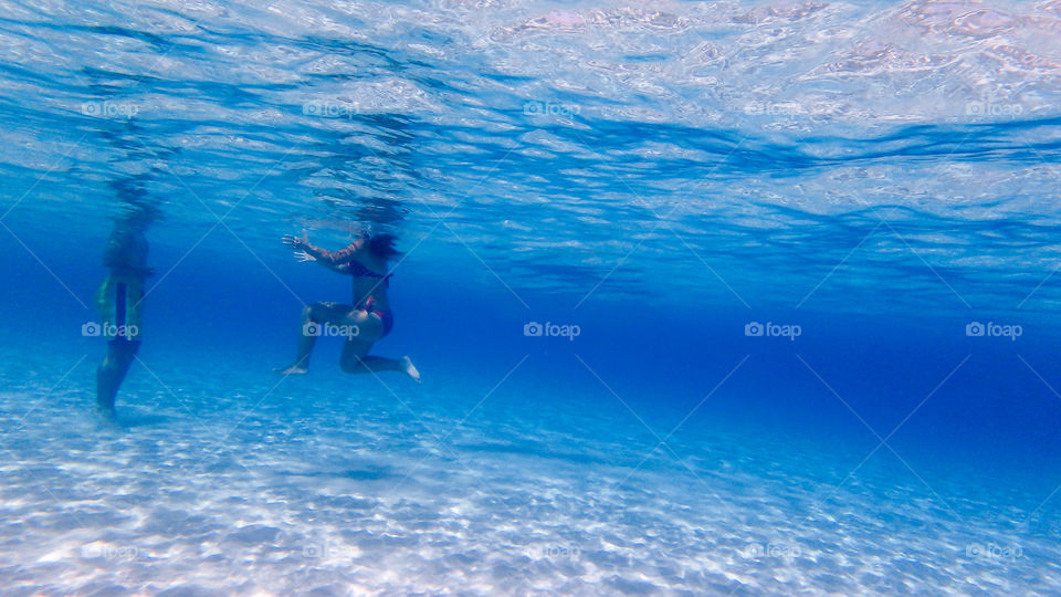beautiful underwater image of sand, sea, rock and fish, dive, diving, ocean, blue, deep, crystal clear