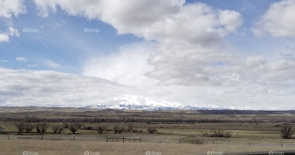 crazy mountains of Montana,  white snow capped and snow still accumulating in April