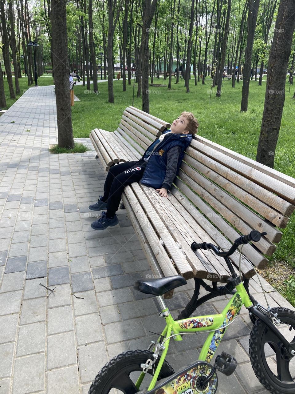 boy resting in the park