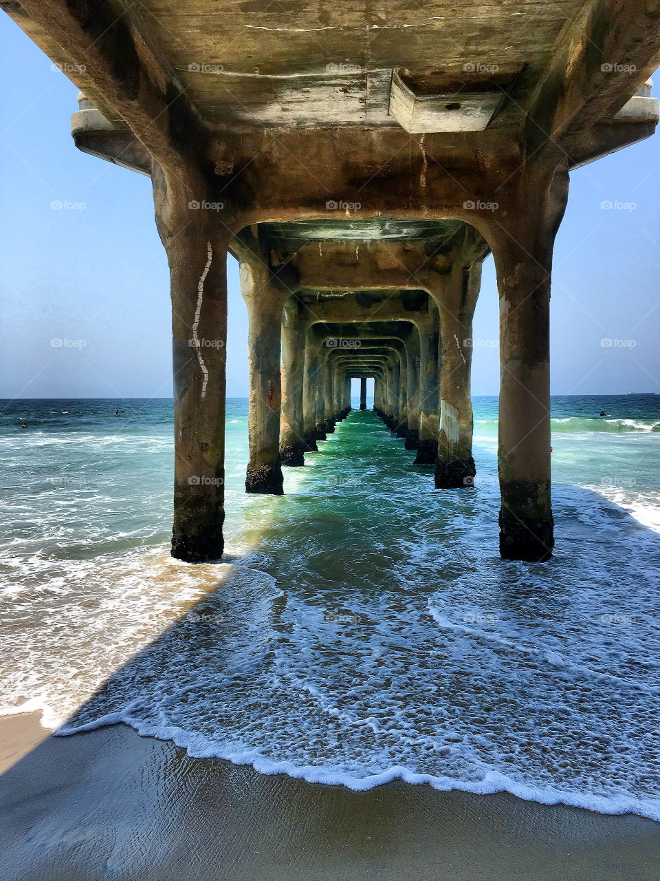 Underneath of pier over sea