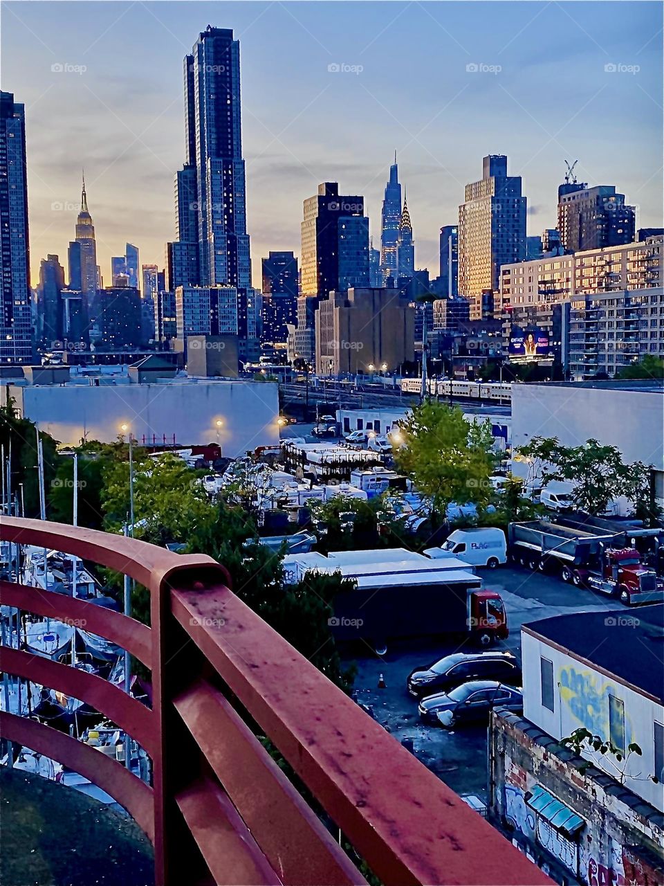 This is the amazing view of “Newtown Creek” and the skylines of LIC, Queens and “Manhattan” from the “Pulaski Bridge” on a warm Indian summer evening in early October 2023. Hypnotic Productions