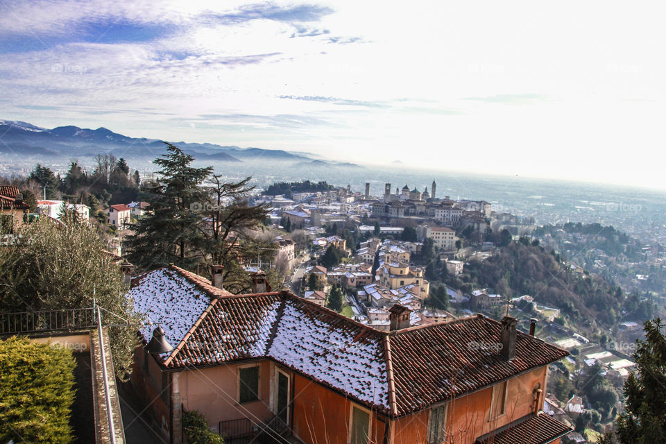 Foggy weather by the mountains.