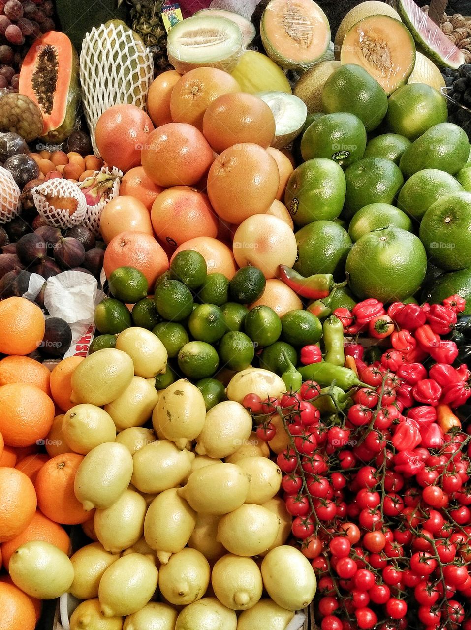 Market with various colorful fresh fruits and vegetables