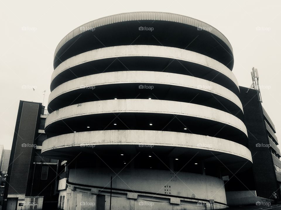 Circular ramp of multi storey car park at The Brewery, Romford, Essex, in Spring.