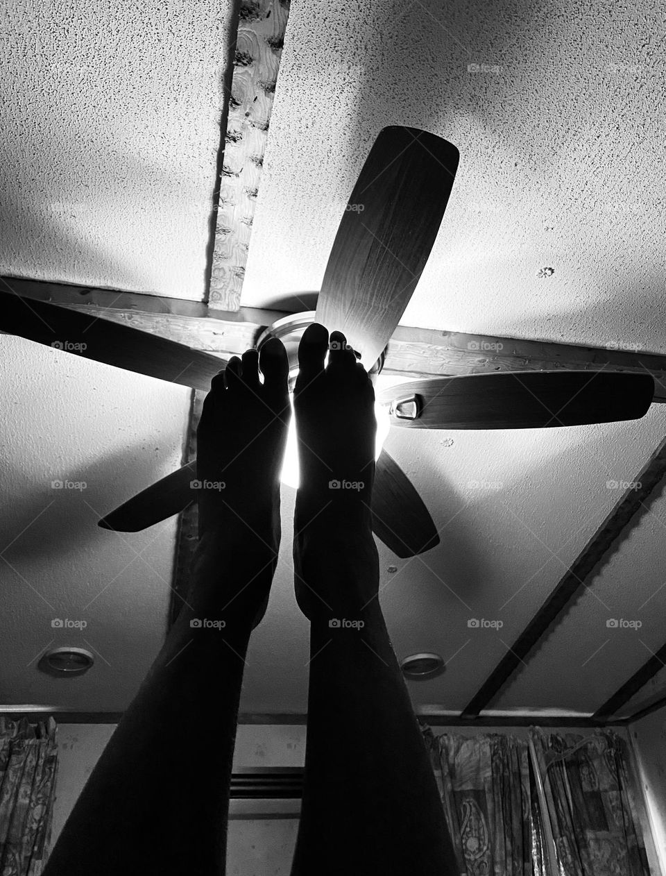 Feet pointing to the ceiling 
