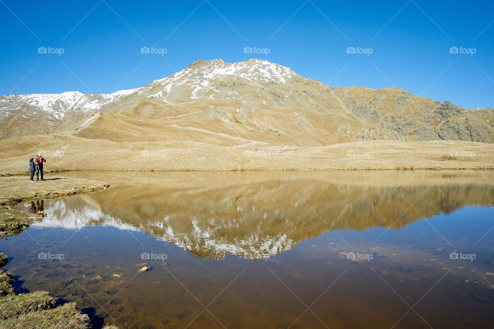 Beautiful reflection in Koruldi lake at the foot of Caucasus mountain , Georgia new landmark for tourists 