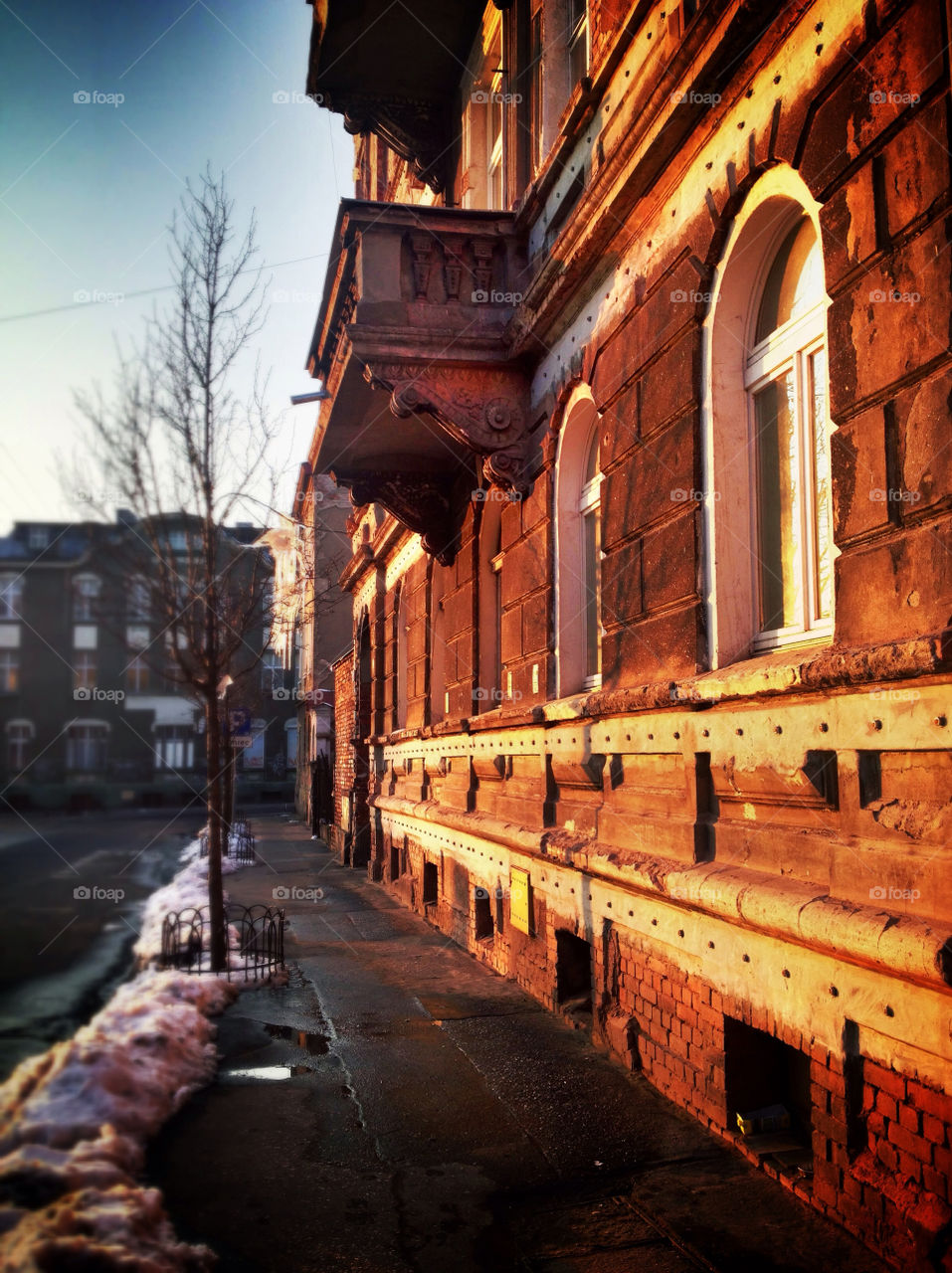 Old tenement house in the sunset light