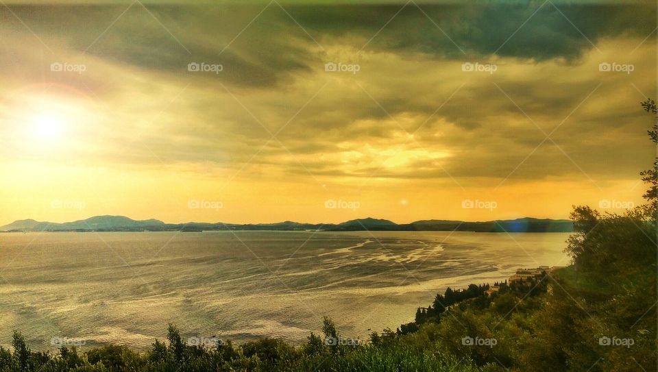 sunset in Greece . taken after a thunderstorm in corfu Greece 