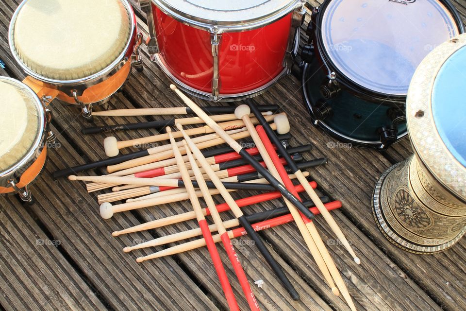Various drumsticks and drums 