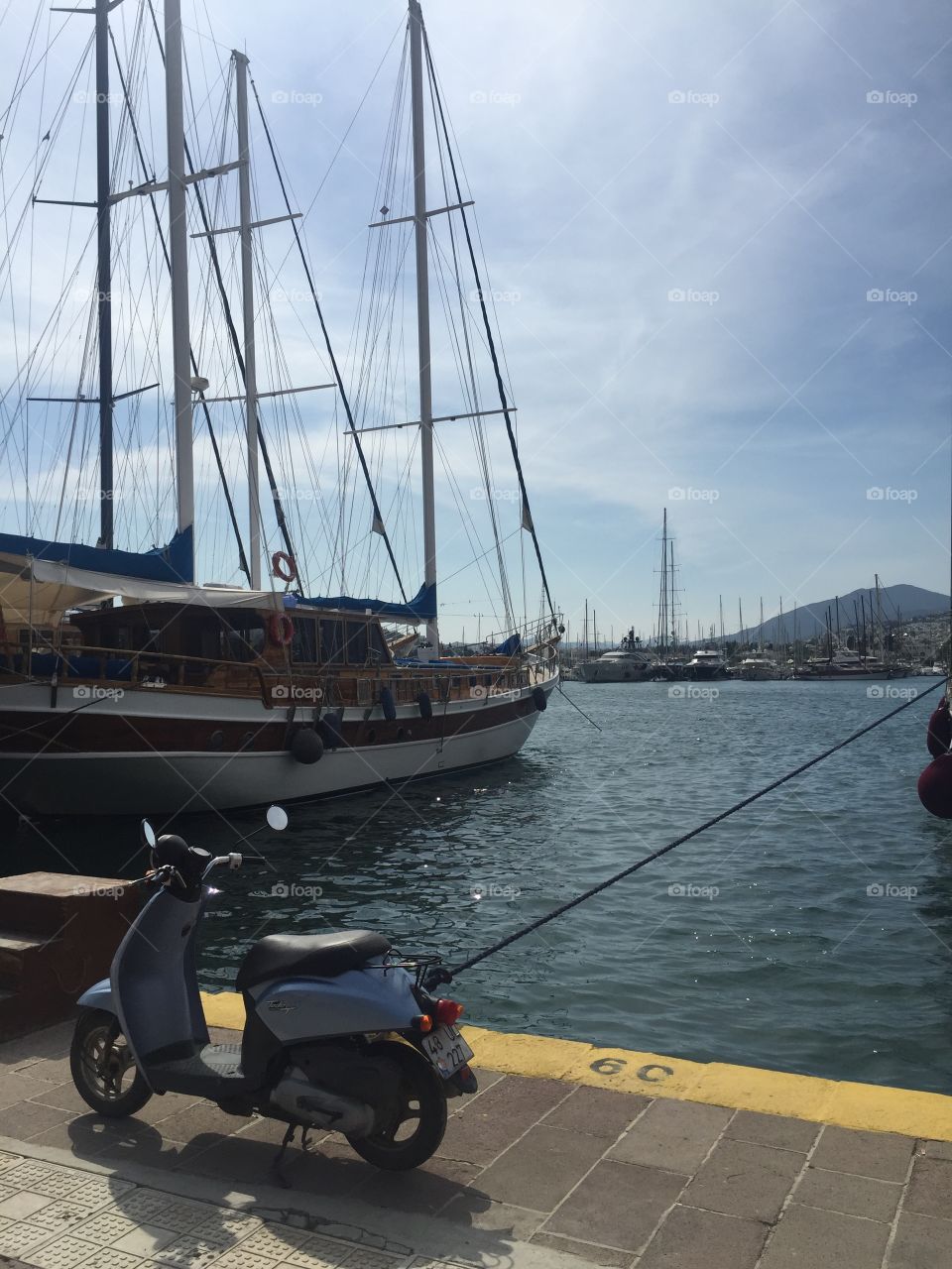 Marina in Bodrum and a motorbike